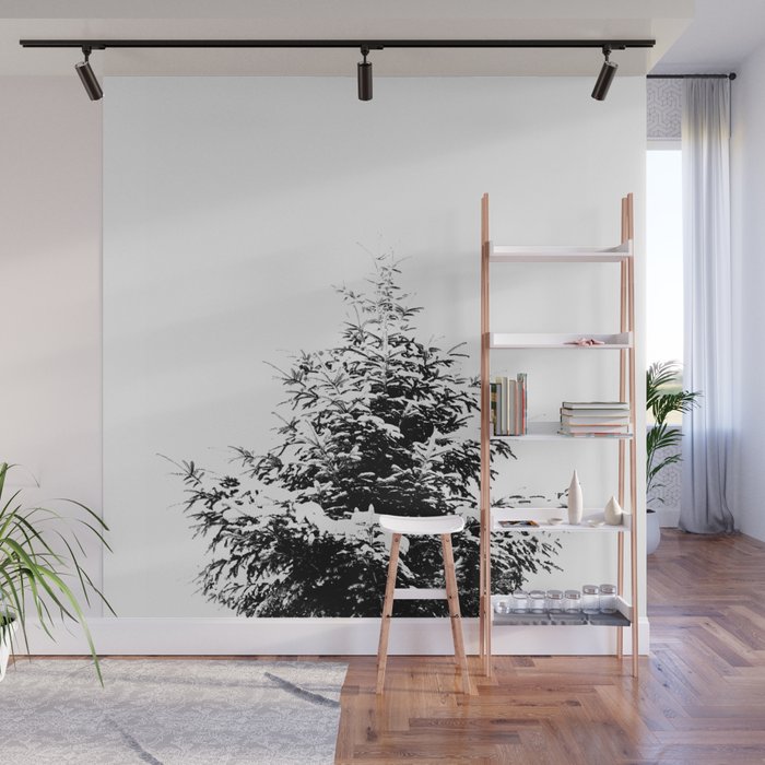 Snowy pine tree minimal black and white nature portrait Wall Mural by ARTbyJWP via society6.com - 21 Winter-inspired wall murals