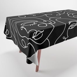 Seamless pattern with abstract faces on black. Tablecloth