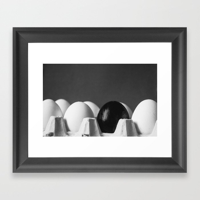 The black egg Framed Art Print