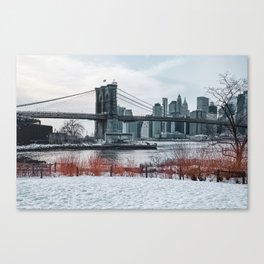 Brooklyn Bridge during winter snowstorm blizzard in New York City Canvas Print