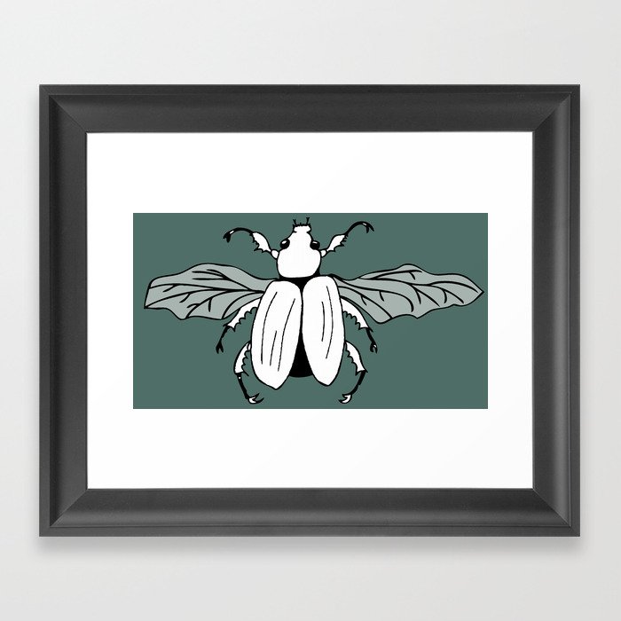 It's a beetle and it has wings. Framed Art Print