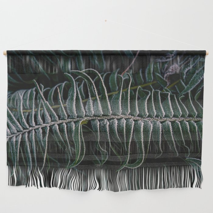Deep green bracken frond with frost Wall Hanging