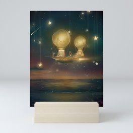Starry night magic flying ship over the ocean at sunset Mini Art Print