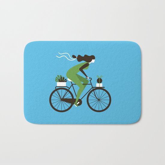 Woman on a Bicycle Bath Mat