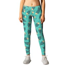 TOSSED SWIMMING FISH in COASTAL BLUE AND CREAM ON TURQUOISE Leggings