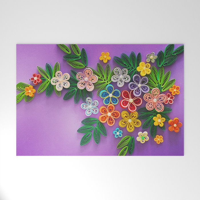 Vivid multicolour quilled flowers on lavender purple background Welcome Mat  by FolkYouAll | Society6