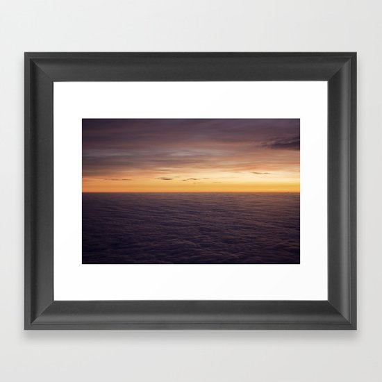 Above the clouds Framed Art Print