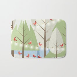 Holiday Winter Scene with Red Bird Santas and Glowing Lights in a Christmas Tree Forest Bath Mat | 19Monkeys, Blue, Winterscene, Christmas, Graphicdesign, Redbirds, Forest, Christmaslights, Green, Winter 