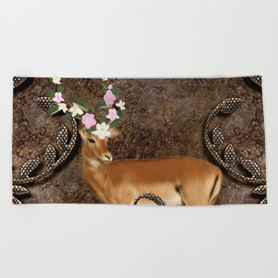 Wonderful antelope with flowers Beach Towel