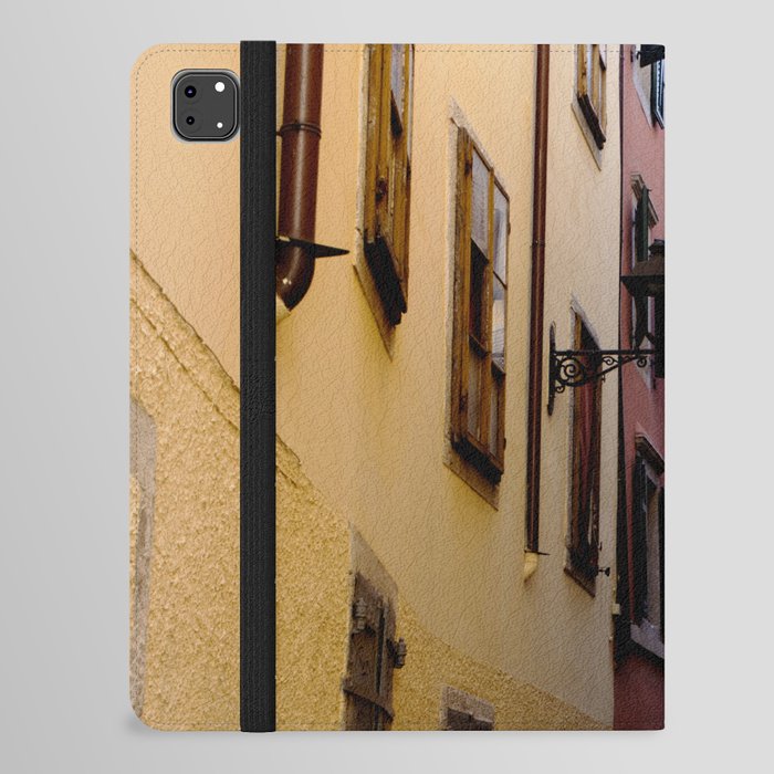 Narrow color street full of vibrant color houses in Italy iPad Folio Case
