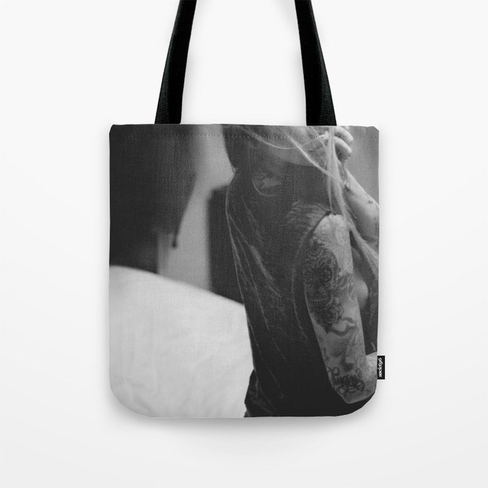 about a girl. Tote Bag