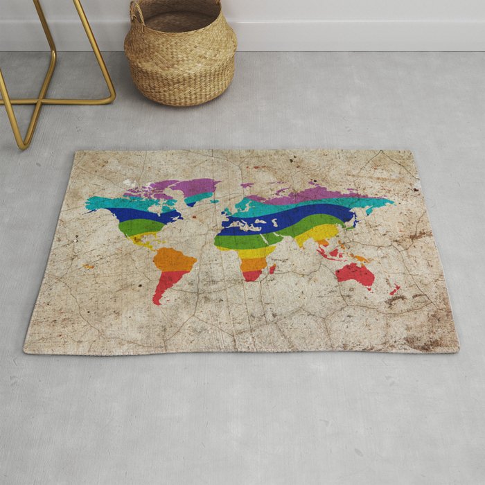 Rainbow color painted world map on dirty old grunge cement wall Rug