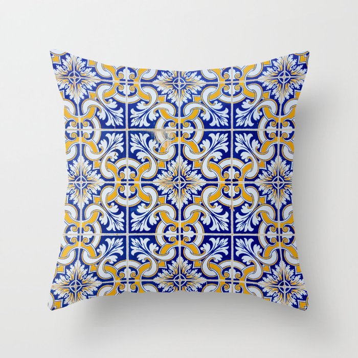Close-up of blue, white and yellow ceramic wall tiles in Tavira, Portugal Throw Pillow