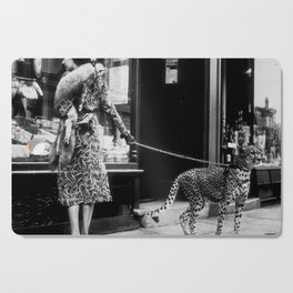 Woman Walking Pet Cheetah in London, 1939 Cutting Board
