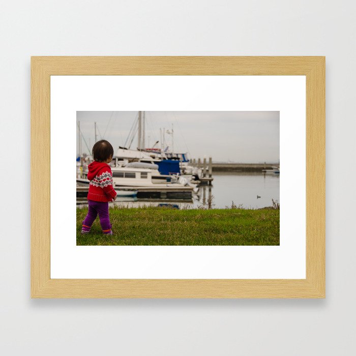 Girl At The Pier Framed Art Print