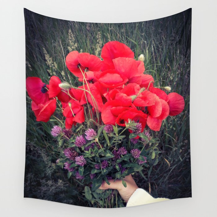 Summer red poppies and clover bloquet in woman's hand field essence Wall Tapestry