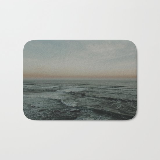 The calm ocean Bath Mat