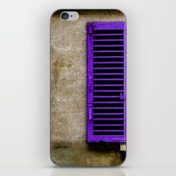 in purple iPhone Skin