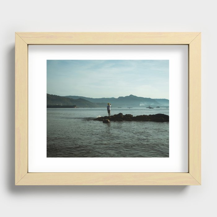 man looking to the mountain from the beach Recessed Framed Print