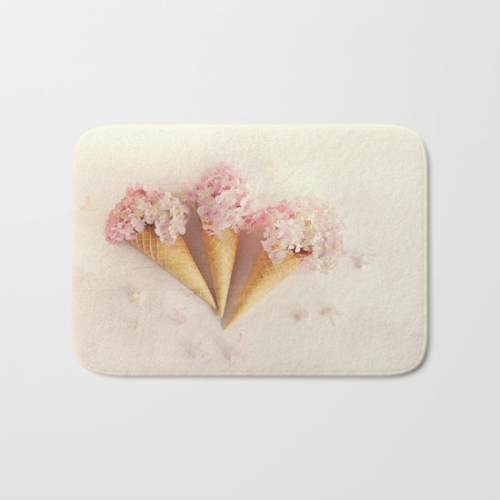 fresh flowers in ice cream cone Bath Mat