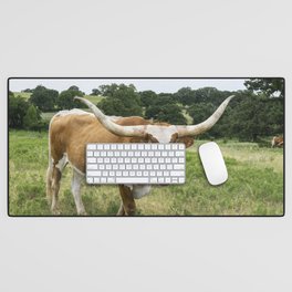 Brown and White Longhorn Standing in Pasture Desk Mat