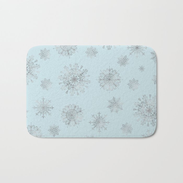 Assorted Silver Snowflakes On Light Blue Background Bath Mat
