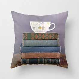 Teacup on a Stack of Vintage Books Throw Pillow