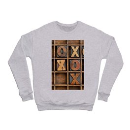 tic-tac-toe or noughts and crosses game - vintage letterpress ing block X and O in wooden grunge typesetter box with dividers Crewneck Sweatshirt