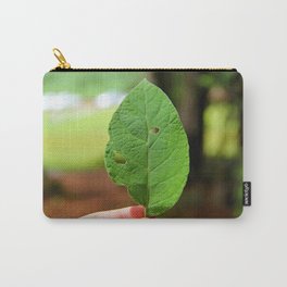 Hand holding leaf Carry-All Pouch