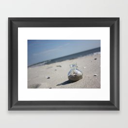 Beach glass bottle Framed Art Print