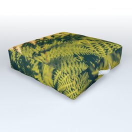 A green fern plants background with shadows.  Outdoor Floor Cushion