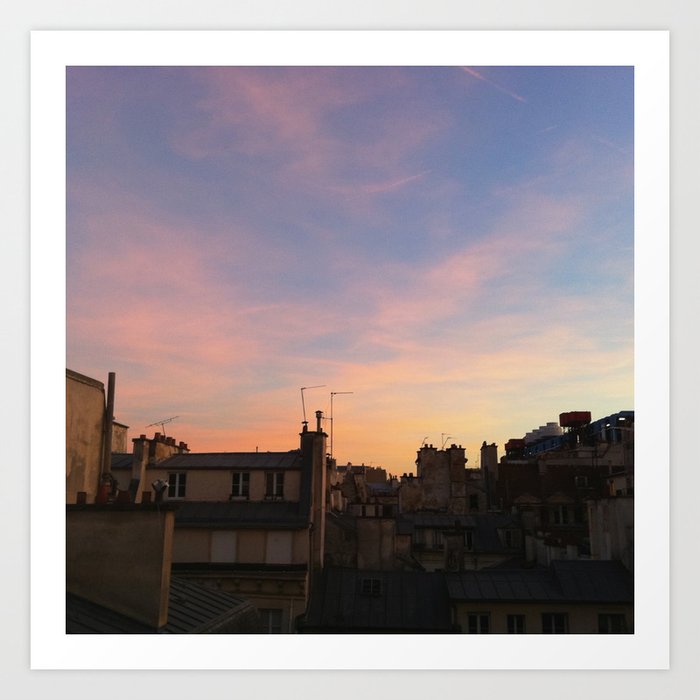Sunset over Paris rooftops Art Print