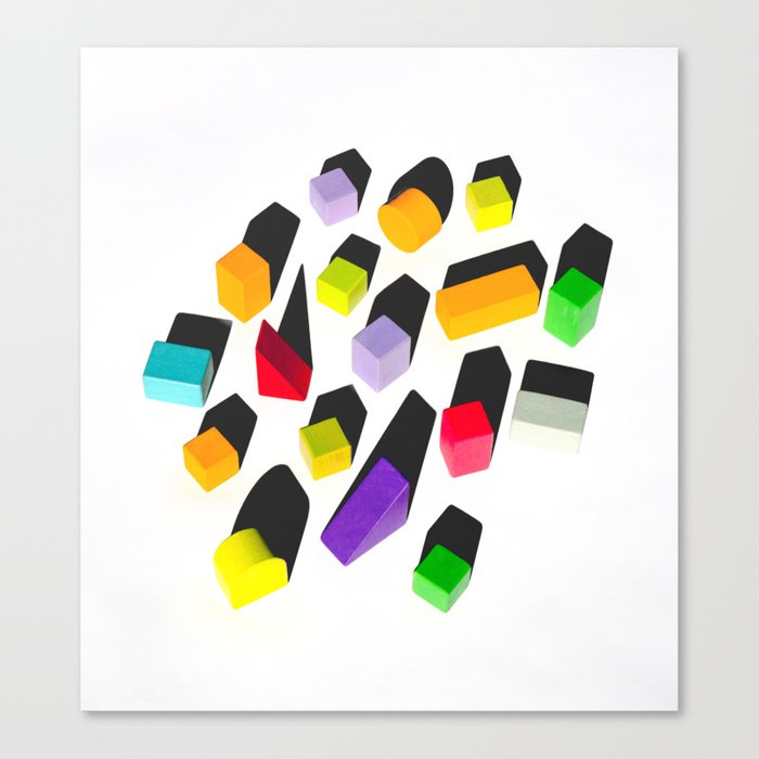 Colorful Children's Toy Blocks with Shadows Canvas Print