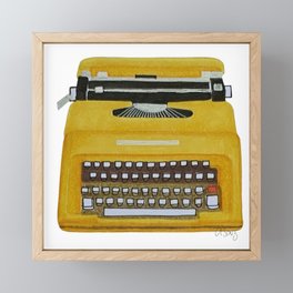 Yellow typewriter Framed Mini Art Print