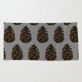 The pine cone on the gray Beach Towel