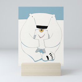 Polar bear eating fish Mini Art Print