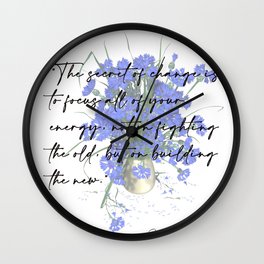 The secret of change is to focus Print poster Wall Clock