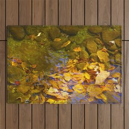 Autumn Leaves In A Creek Outdoor Rug