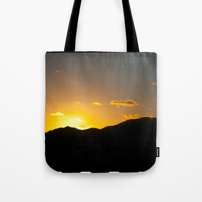 Color photo of mountain sunset with film strip decoretion Tote Bag