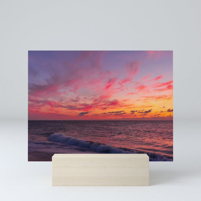 Magical sunset colors in the sky above the sea Mini Art Print