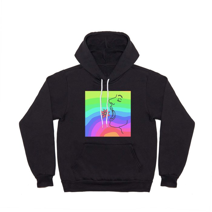 Eating a flower, with hunger, on a rainbow background Hoody