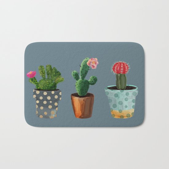 Three Cacti With Flowers On Blue Background Bath Mat
