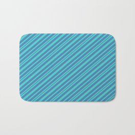 [ Thumbnail: Turquoise & Blue Colored Striped/Lined Pattern Bath Mat ]