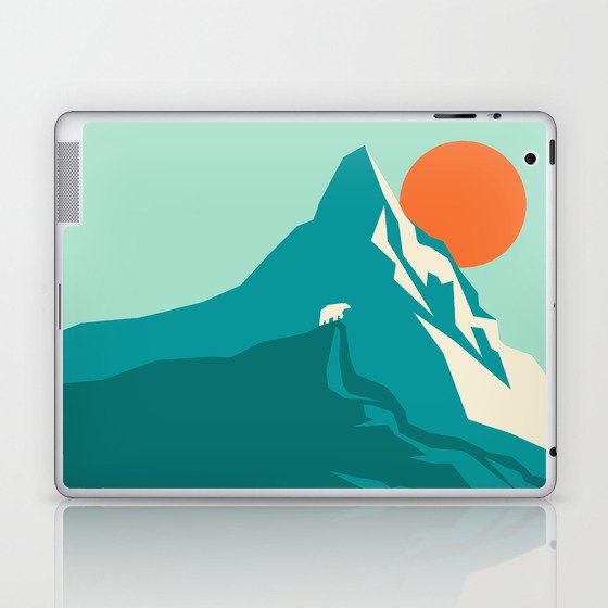 As the sun rises over the peak Laptop & iPad Skin