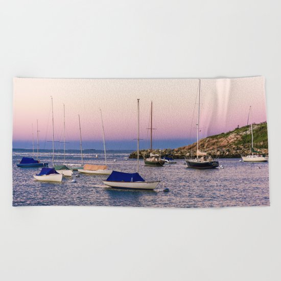 Earth's shadow over the harbor Beach Towel