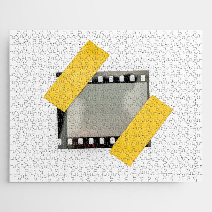 blank or empty 35mm dia film frame fixed by two yellow adhesive strips