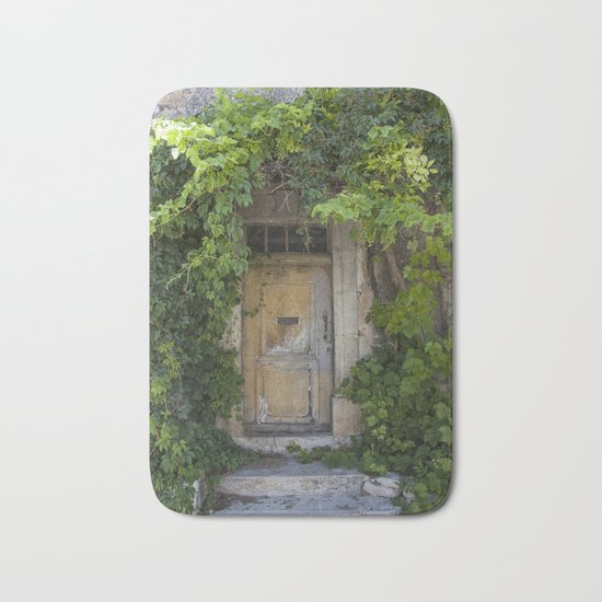 Provence Door covered with green vines Bath Mat
