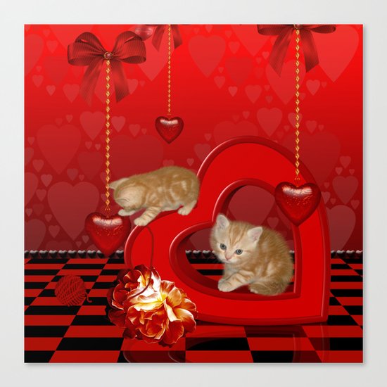 Cute, playing kitten Canvas Print