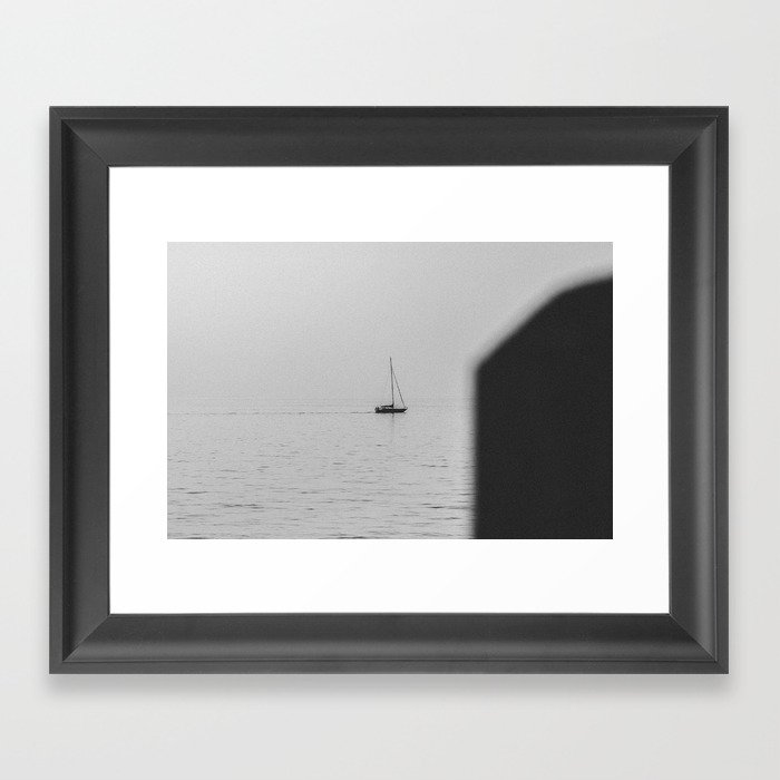 lonely sailboat Framed Art Print