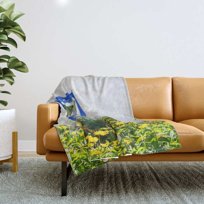 Old rustic house with high yellow flowers in the garden Throw Blanket